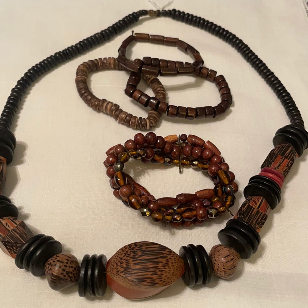 Wooden necklace and four bracelets.